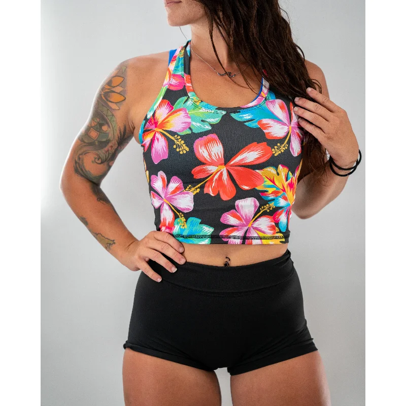 Salty Savage Ladies Racerback Performance Crop Tank | Hawaiian Flowers vibrant tank top
